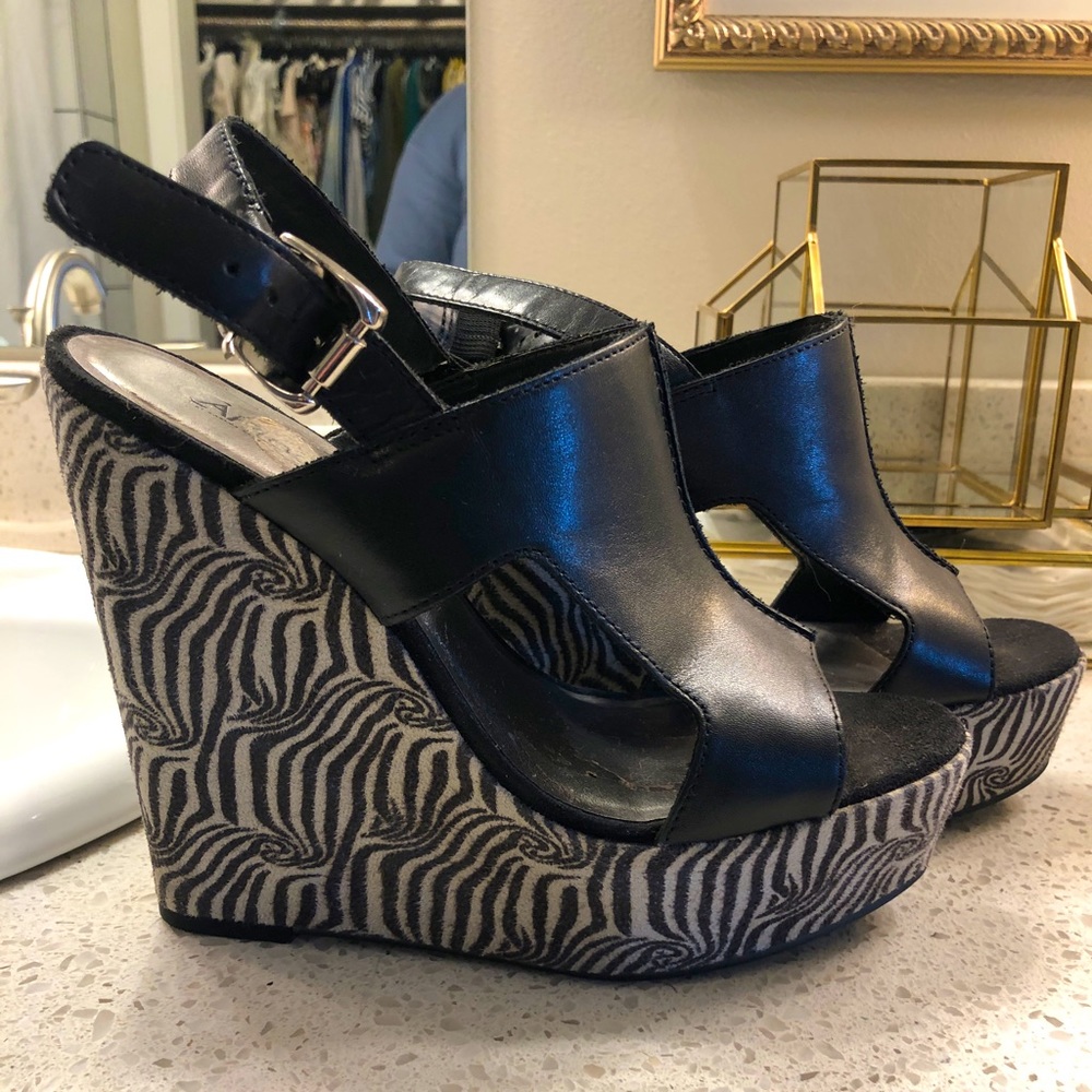 Carlos Santana Wedges
